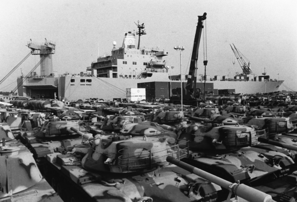 WILMINGTON, NC (July 3, 1980) U.S. Marine Corps’ M-60A1 tanks await loading on USNS MERCURY (T AKR 11), a roll-on, roll-off ship of the Navy’s Military Sealift Command, during Leading operations this week. (Photo by PH3 George Bruder, USN/DoD Image)