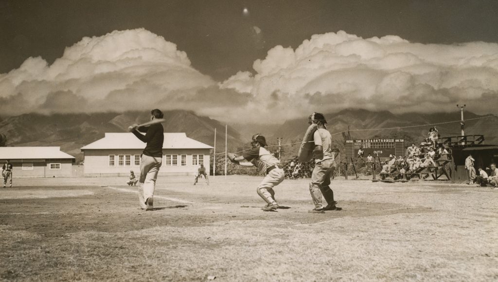 Marines and Seabees play Baseball in a USO sponsored league on one of several baseball fields on Maui.